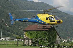 San Vittore/GR, July 2013 - The AS 350B3 Ecureuil HB-ZCM in service with Heli Rezia with its new look (P. Menucelli)