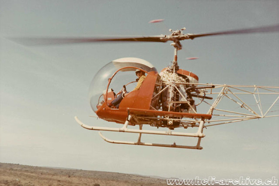 South Africa 1970 - Walter Hügel at the controls of Bell 47G5 ZS-HCK used for the census of wild animals (family Hügel)