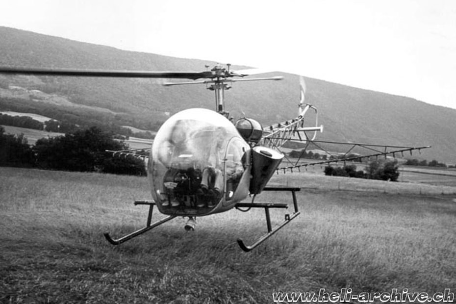 1957 - Emil Müller at the controls of the Agusta-Bell 47G HB-XAV fitted with a spray equipment (archive W. Demuth)
