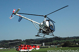 Belp/BE, September 2006 - The Schweizer 300C HB-ZHU in service with Heliswiss (K. Albisser)