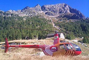 Monti di Biasca/TI, September 2010 - The Robinson R-44 Raven II HB-ZGM in service with Mountain Flyers 80 Ltd. (G. Mossi)