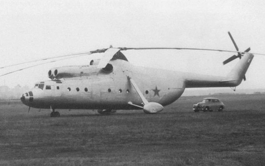1957 - The prototype of the Mil Mi-6 photographed at Zakharkovo airfield. Compare the size of the helicopter with those of the car (archive Mil)