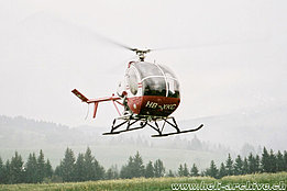 1980s - The Schweizer 300C HB-XKC in service with Robert Fuchs (HAB)