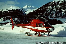Samedan airport/GR, February 2003 - The AS 350B Ecureuil HB-XJW in service with Heliswiss (photo Toni Heumann)