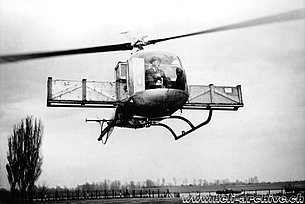 February 1957 - Joe Mashmann at the controls of the Bell 47J Ranger HB-XAU (HAB)