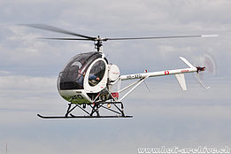 Belp/BE, September 2010 - The Schweizer 300C HB-XFQ in service with Heliswiss (K. Albisser)