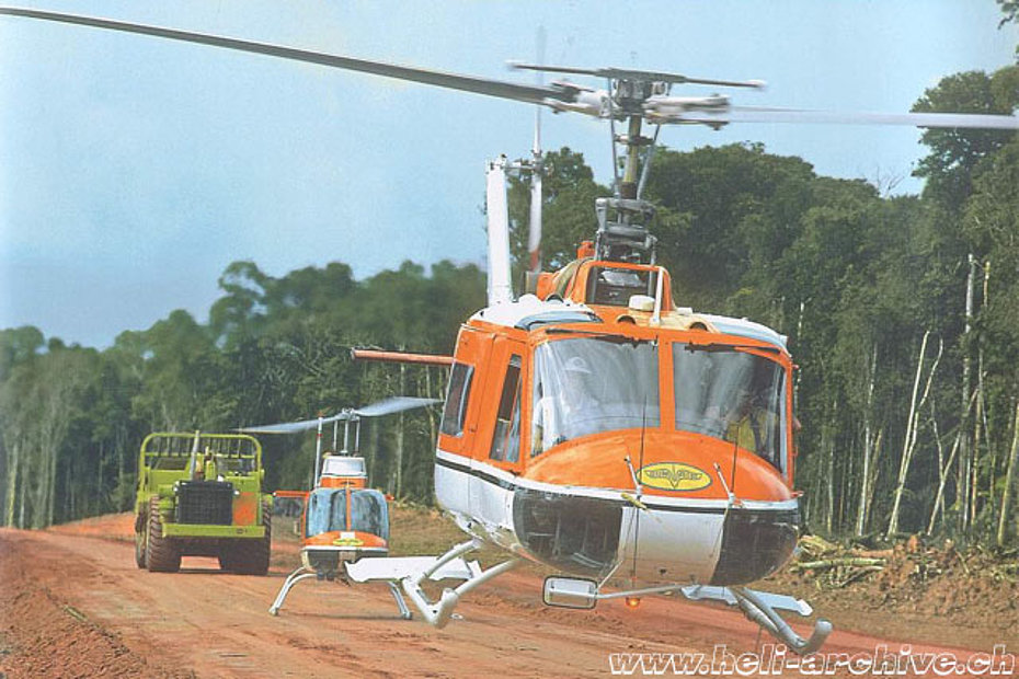 Suriname - JB Schmid at the controls of the Agusta-Bell 204B in service with Heliswiss (P. Aegerter)
