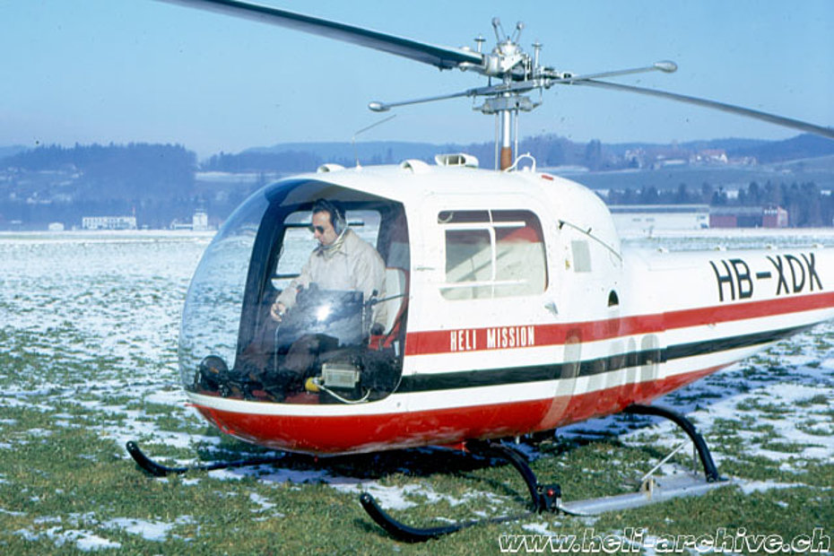 Berne/Belp airport, winter 1971 - The Swiss missionary Ernst Tanner at the controls of the Bell 47J Ranger HB-XDK (Helimission)