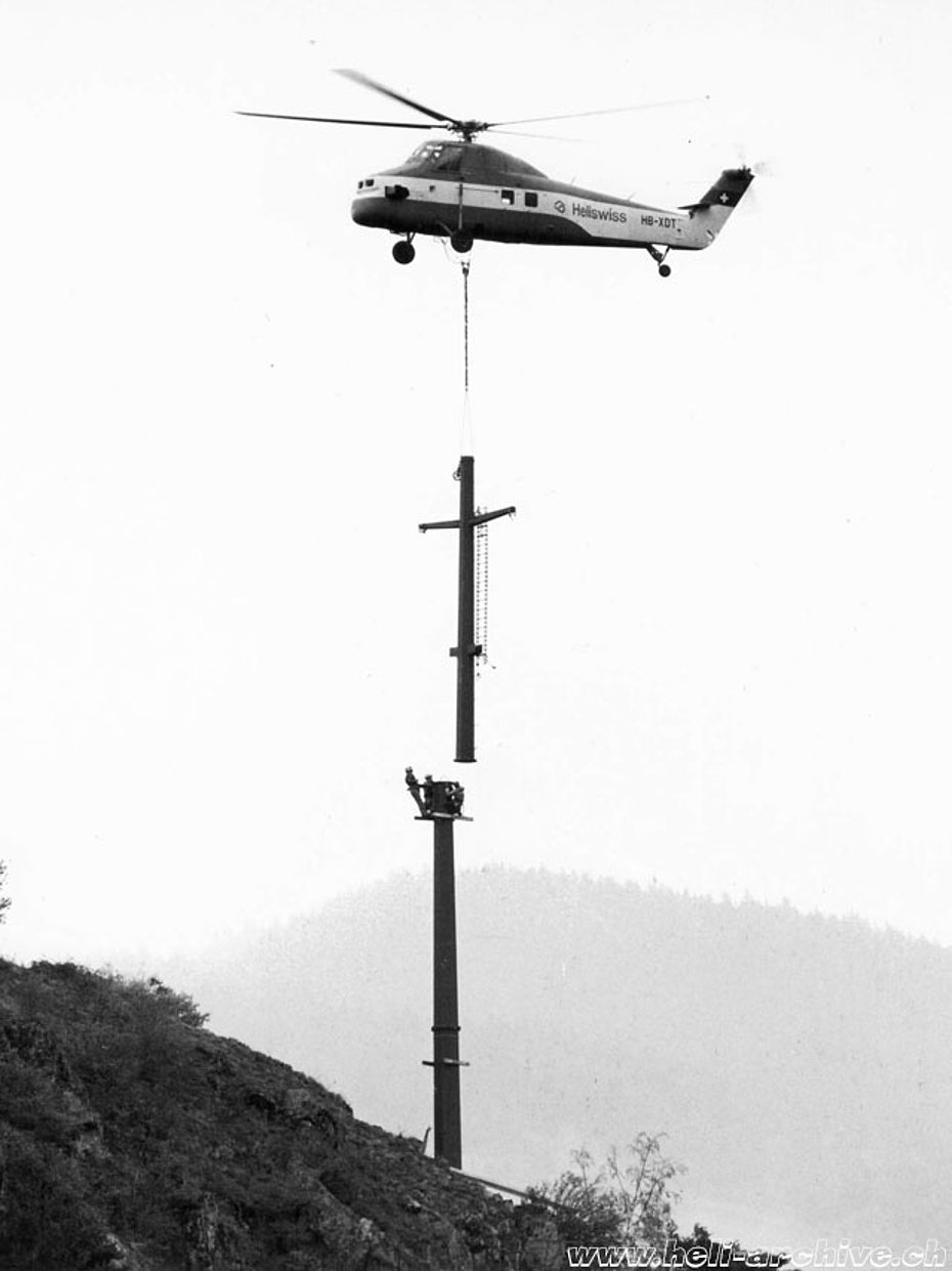 Swiss Alps, 1970s - Aerial assembly of pylons like this required great skills (HAB)