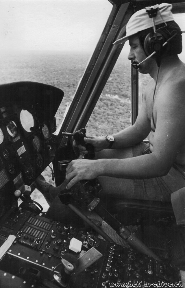 Suriname 1972 - Walter Hügel photographed while piloting Agusta-Bell 204B HB-XCQ in service with Heliswiss (family Hügel)